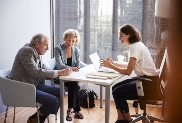 older couple working with financial planner
